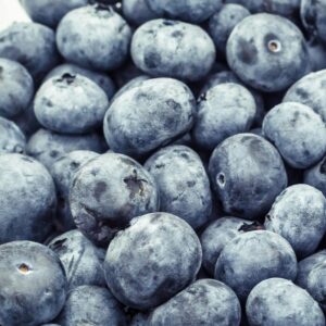A vibrant close-up image of fresh, organic blueberries. Perfect for healthy food themes.